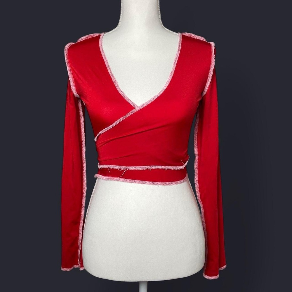 Long sleeve wrap tie top

Size: XS/S